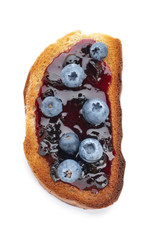 Tasty toasted bread with berry jam on white background