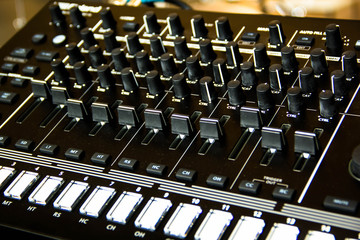 sound studio adjusting record equipment