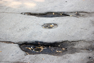 large pits with asphalt.