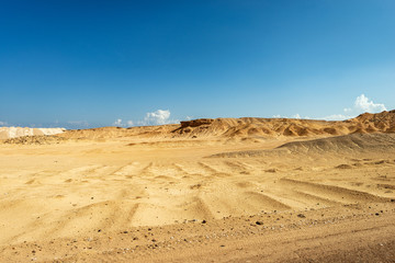 Fototapeta na wymiar The Sahara desert along the coast of the Red Sea, near Marsa Alam, Egypt, Africa