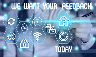 Text sign showing We Want Your Feedback. Business photo showcasing criticism given someone say can be done for improvement Female human wear formal work suit presenting presentation use smart device