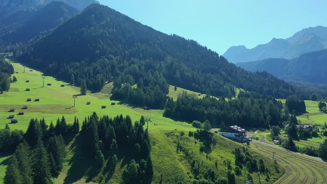 Aerial view of foot of Zugspitze mountain, highest peak of Germany and Wetterstein Mountains during summer - landscape panorama of Alps from above, Germany/Austria border, Europe