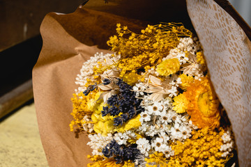 bouquet of dried flowers under the sun