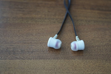 A pair of earphones on the table