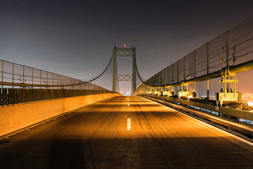 Fototapeta na wymiar Night view of Vincent Thomas Bridge between San Pedro and Terminal Island in Los Angeles, California. 