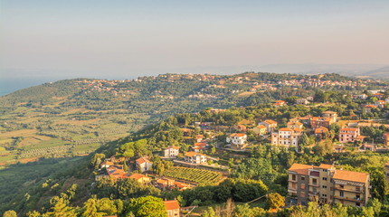 Obraz premium Italian city Montefiascone on mountain near lake