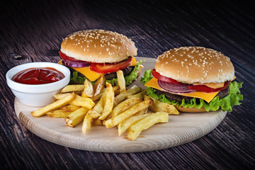 Delicious burgers with fries
