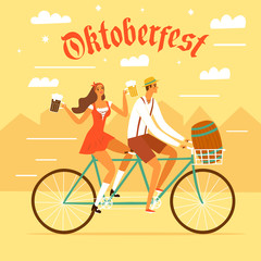 Bavarian couple in a traditional costumes on tandem bicycle with beer on Octoberfest