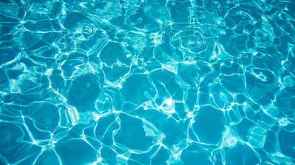 Blue ripped water in swimming pool. water surface background.