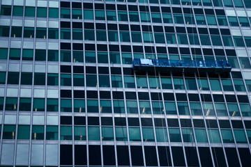 Window washers in a skyscraper