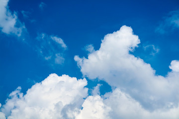 Naklejka na ściany i meble white heap cloud sunshine in tropical blue sky soft cloud