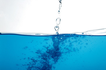 blue water surface with splash