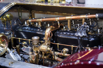 Fototapeta na wymiar antique brass automotive engine