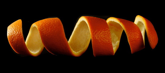 Orange peel isolated on black background