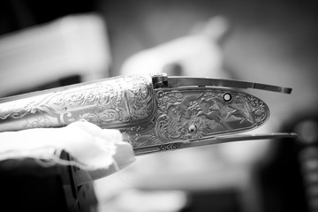 Engraved gun part