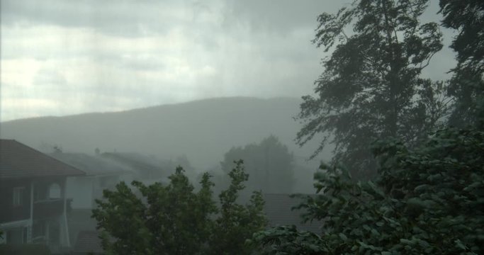 Extreme weather situation in bavaria with heavy winds, rain and hail.