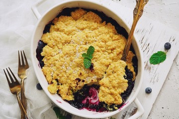 Homemade Blueberry cornmeal Cobbler baked in a Ramekin