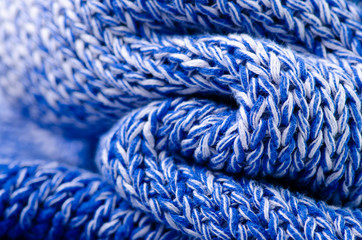 Blue white warm knited material fabric sweater texture blur background