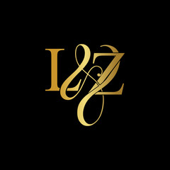 Initial letter LZ L Z luxury art vector mark logo, gold color on black background.	