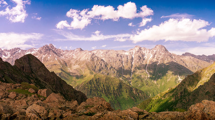 bright panoramic view of the mountain range at sunrise. Toned