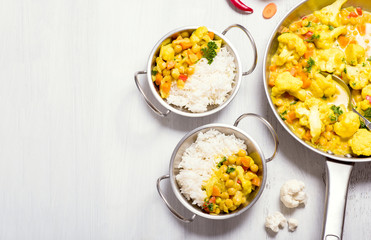 Vegetarian curry with cauliflower and chickpeas, healthy homemade vegan food, indian cuisine, clean...