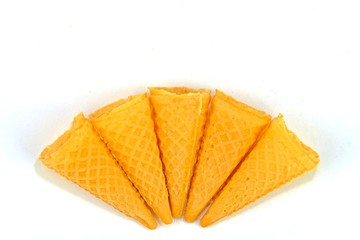 Ice cream cones arranged in fan-shape on white background.