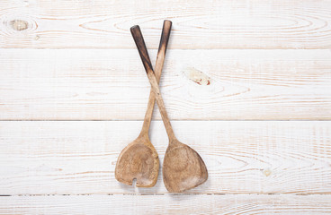 Wooden Kitchen Utensils. Wood spoons on table.
