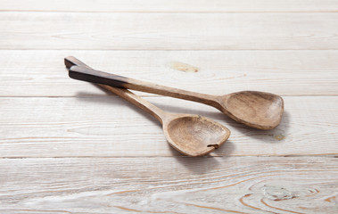 Wooden Kitchen Utensils. Wood spoons on table.