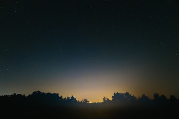 Obraz na płótnie Canvas Blue dark night sky with many stars. Space background