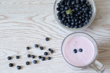 Bowl with blueberries. Yogurt with berry. Healthy breakfast.
