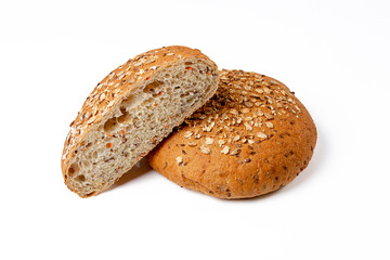Whole wheat bread isolated on white background. One and a half sliced
