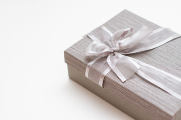 silver gift box with bow