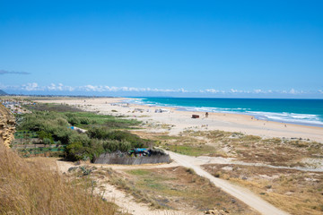 landscape of Bateles Beach, from top, in Conil de la Frontera (Cadiz, Andalusia, Spain)