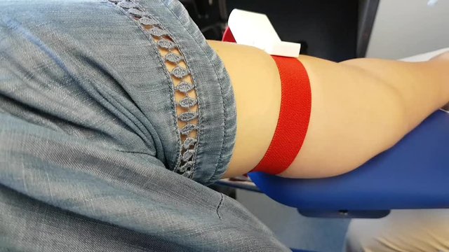 taking blood from a vein for analysis