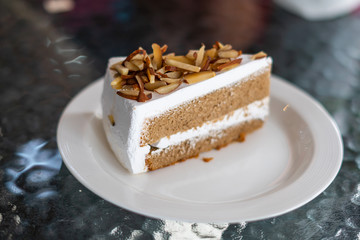coffee almond cake on white dish