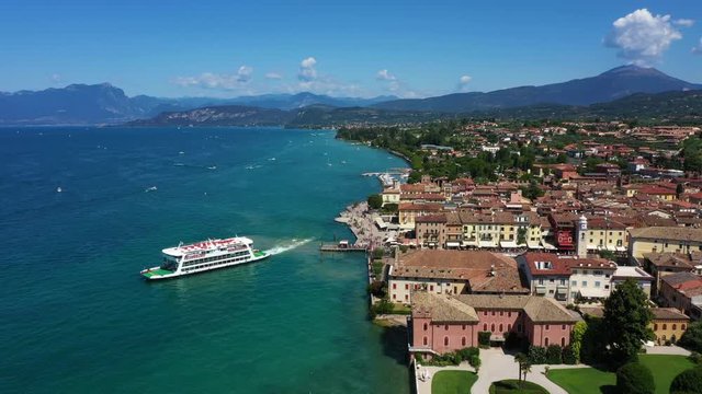 Aerial video with drone. Beautiful view of the city of Lazise, Italy. Garda lake.