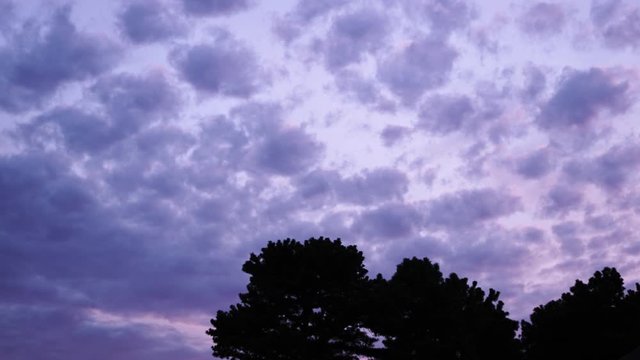 Early sun coming up on clouds