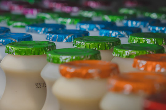 Fermented Milk On Shelves At Convenience Store 