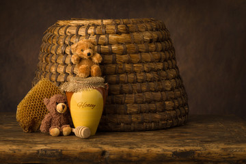 Honey pot and old beehive
