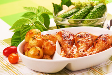 Roasted chicken with baked potaotes