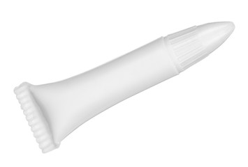 white tube of glue for false eyelash isolated white background
