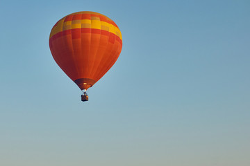 Balloon soaring into the sky.