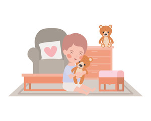 cute little boy baby with bear teddy in livingroom