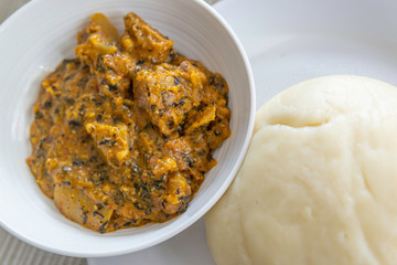 Nigerian Pounded Yam served with Spicy Bitterleaf soup