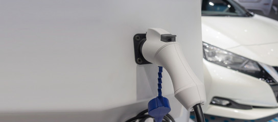 website banner. EV Tech. power supply connect station for electric vehicle battery charge for future, electric car, technology transport industry, power saving, global warming, automobile concept