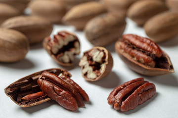Group of pecan nuts on the white background
