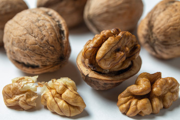 Group of walnuts and peeled walnuts 