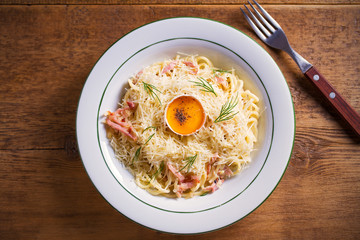 Carbonara pasta, spaghetti with pancetta, egg, parmesan cheese and cream sauce. Pasta alla carbonara - Italian cuisine dish