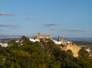 Fototapeta na wymiar Panoramic view of Arcos de la Frontera, Andalucia. Arcos Skyline with Sierra de Cadiz in the background.