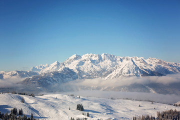 Scenery landscape in Austrian Apls in ski areal, winter snow landscape in beautiful mountains